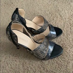 Silver and black heels